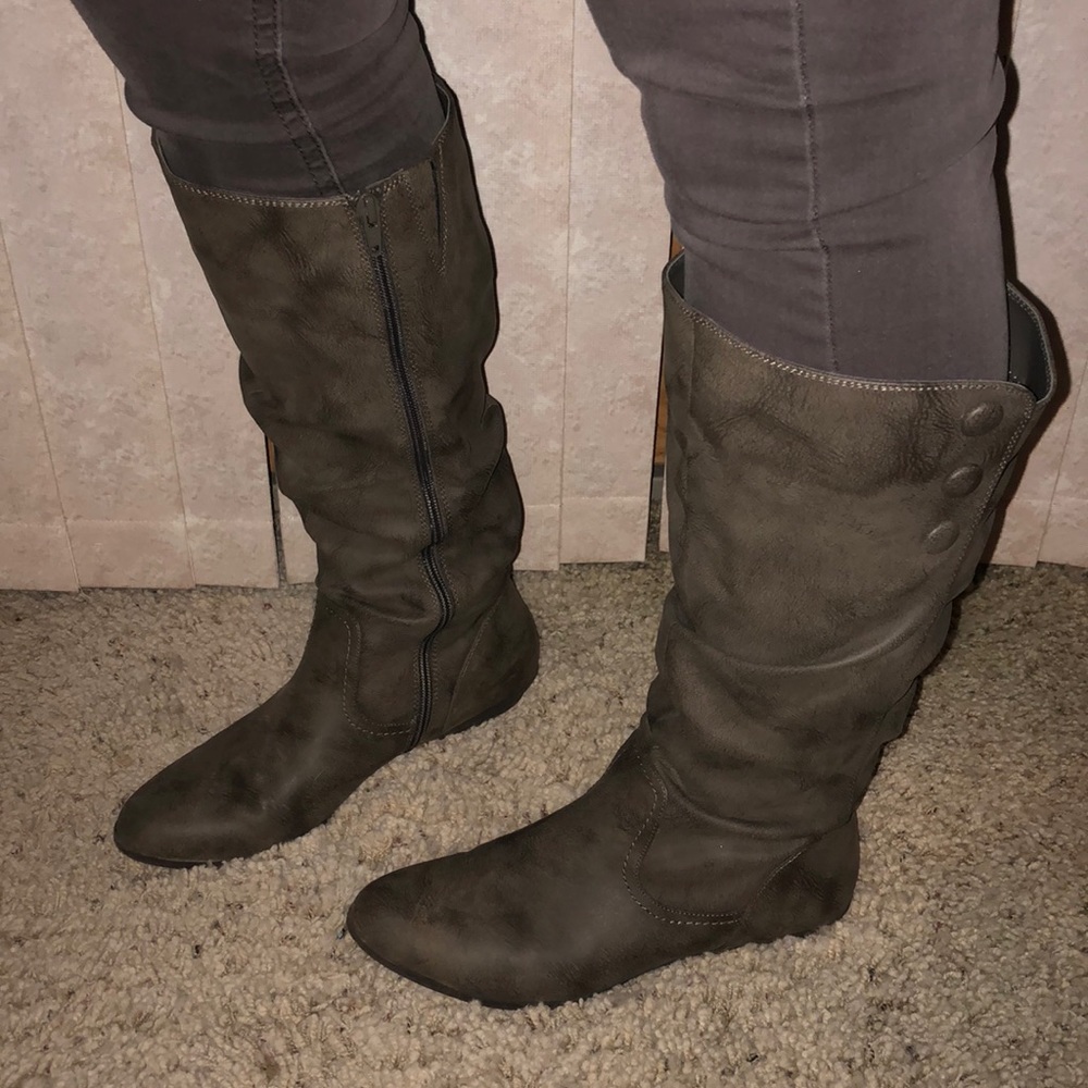 Pair of gray leather knee high boots